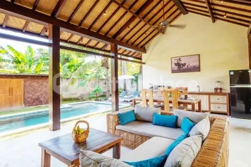 Two Side-by-side Freehold Beach Villas for Sale